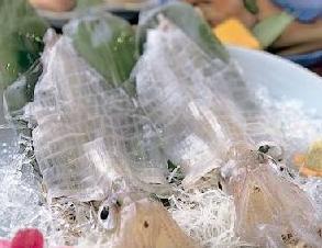Live squid sashimi