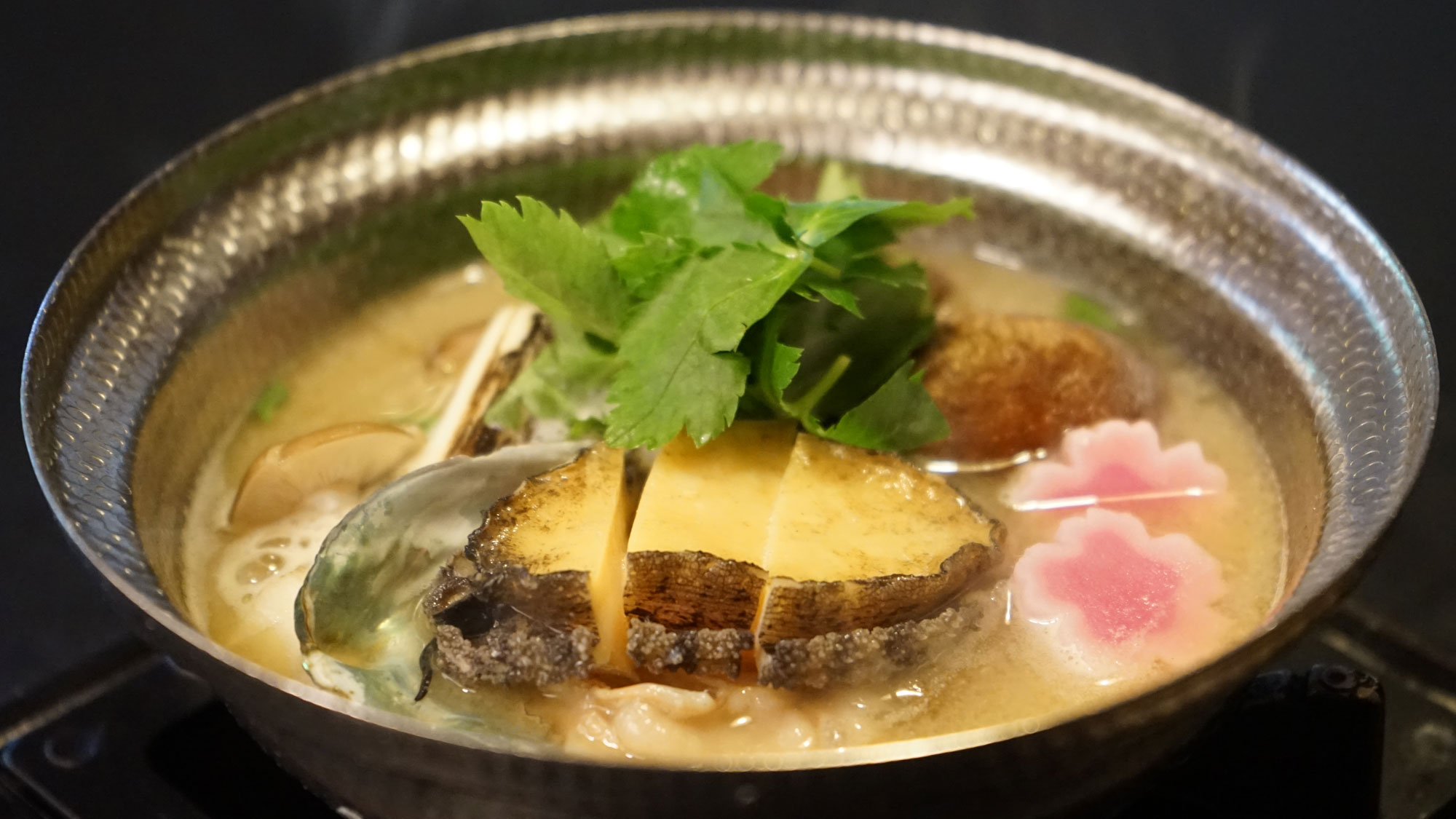 鮑の酒粕鍋（写真は料理一例です）