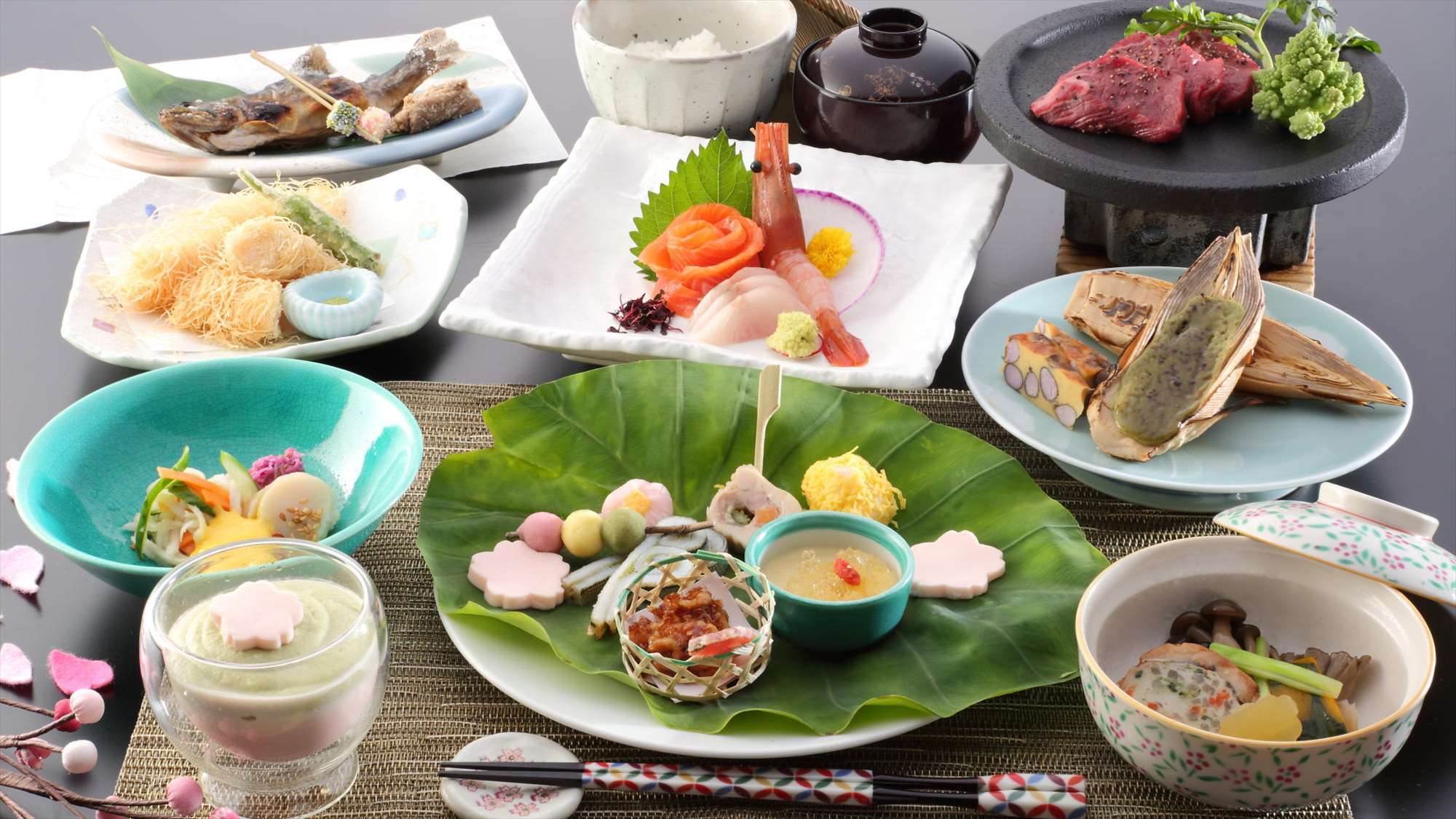 春のご夕食一例　～地元の食材を使ったお料理を月替わりでご用意しております。～※イメージ
