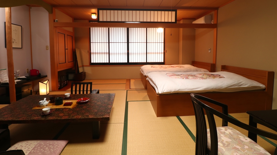 #客室一例　ベッド付12.5畳(B・T付)　ツインベッドのお部屋。ゆったりとお過ごしいただけます。　