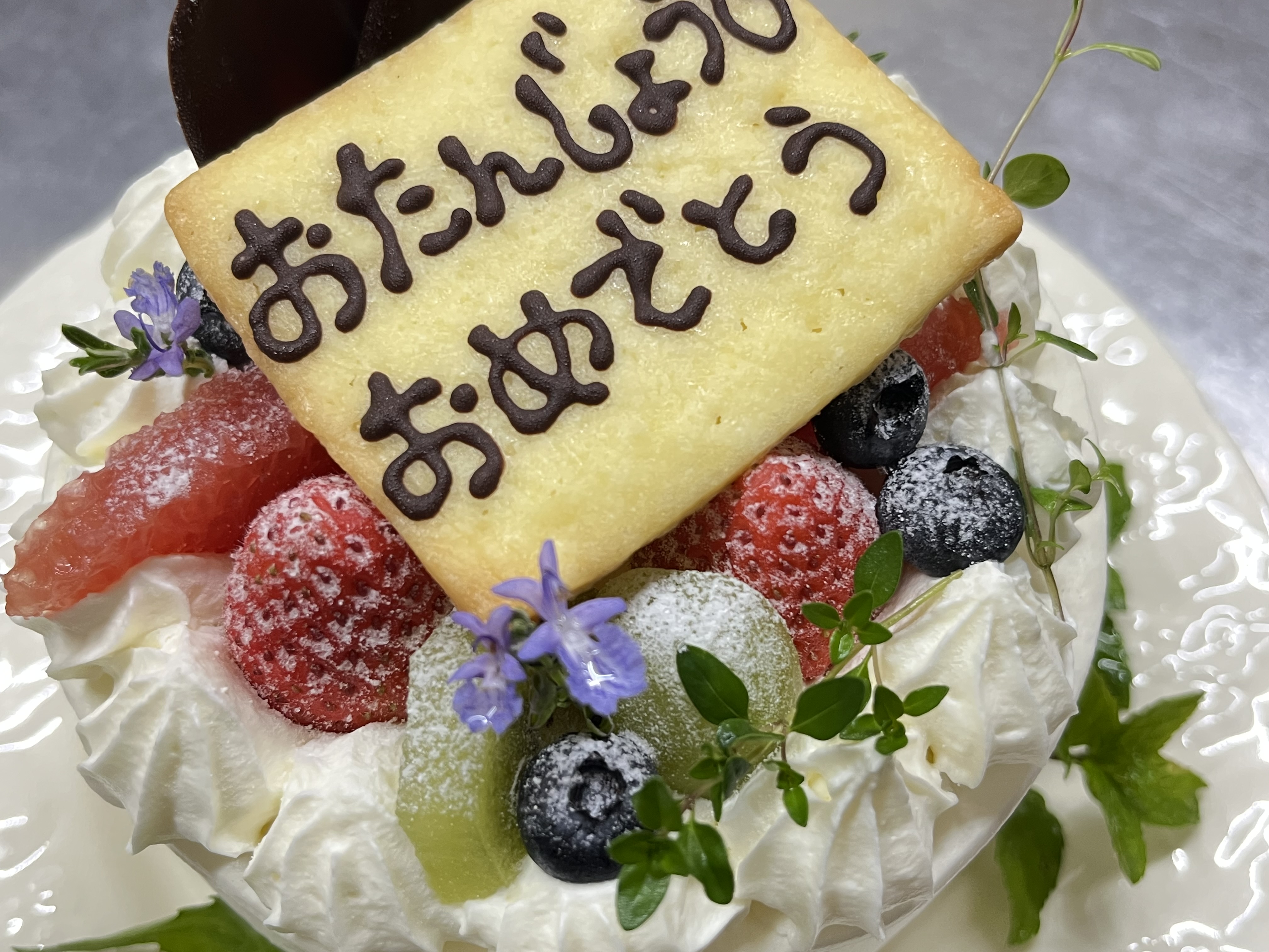 サプライズケーキでお祝い！