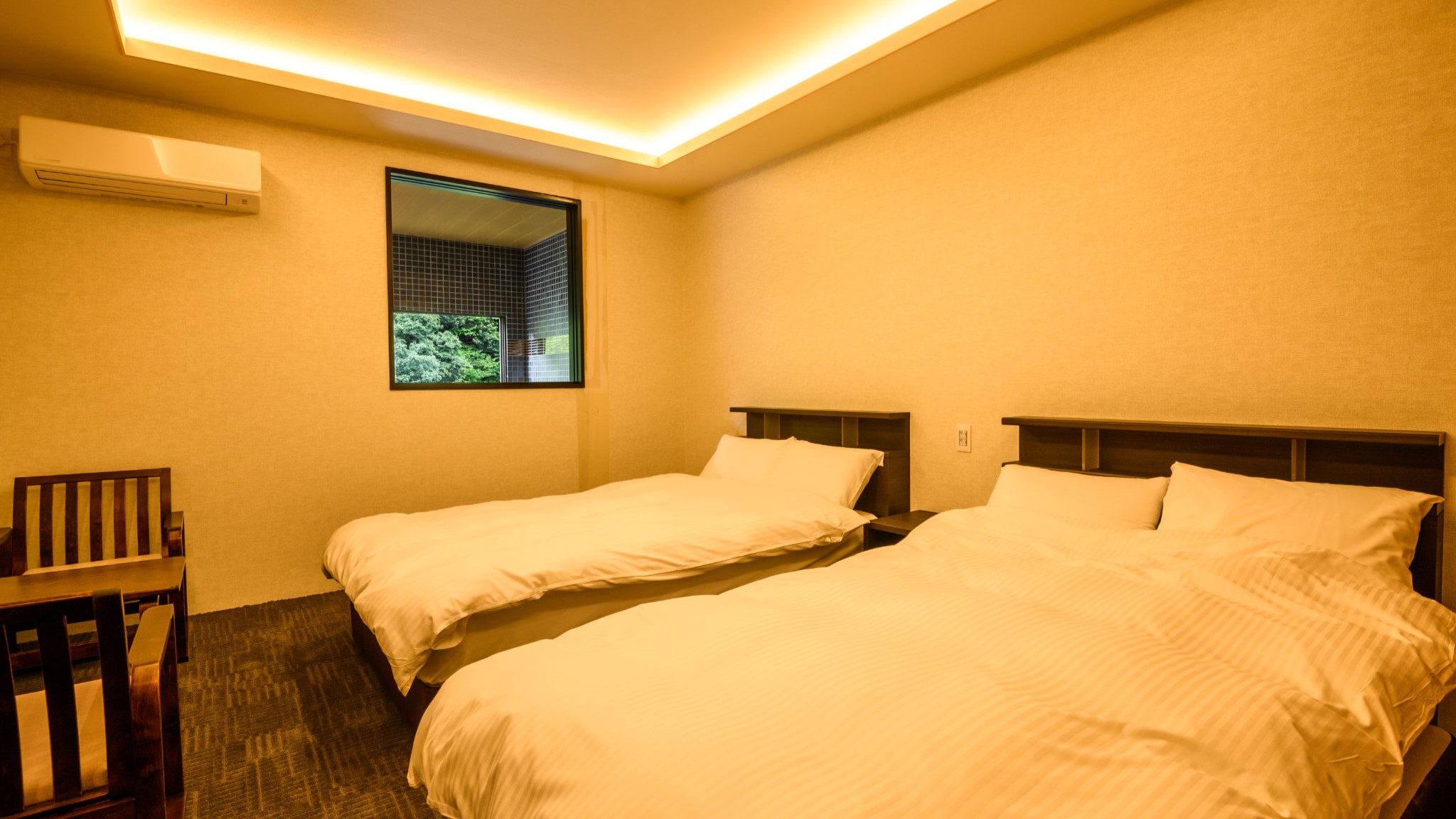 【源泉露天風呂＆サウナ付き洋室ツイン】洋室イメージ