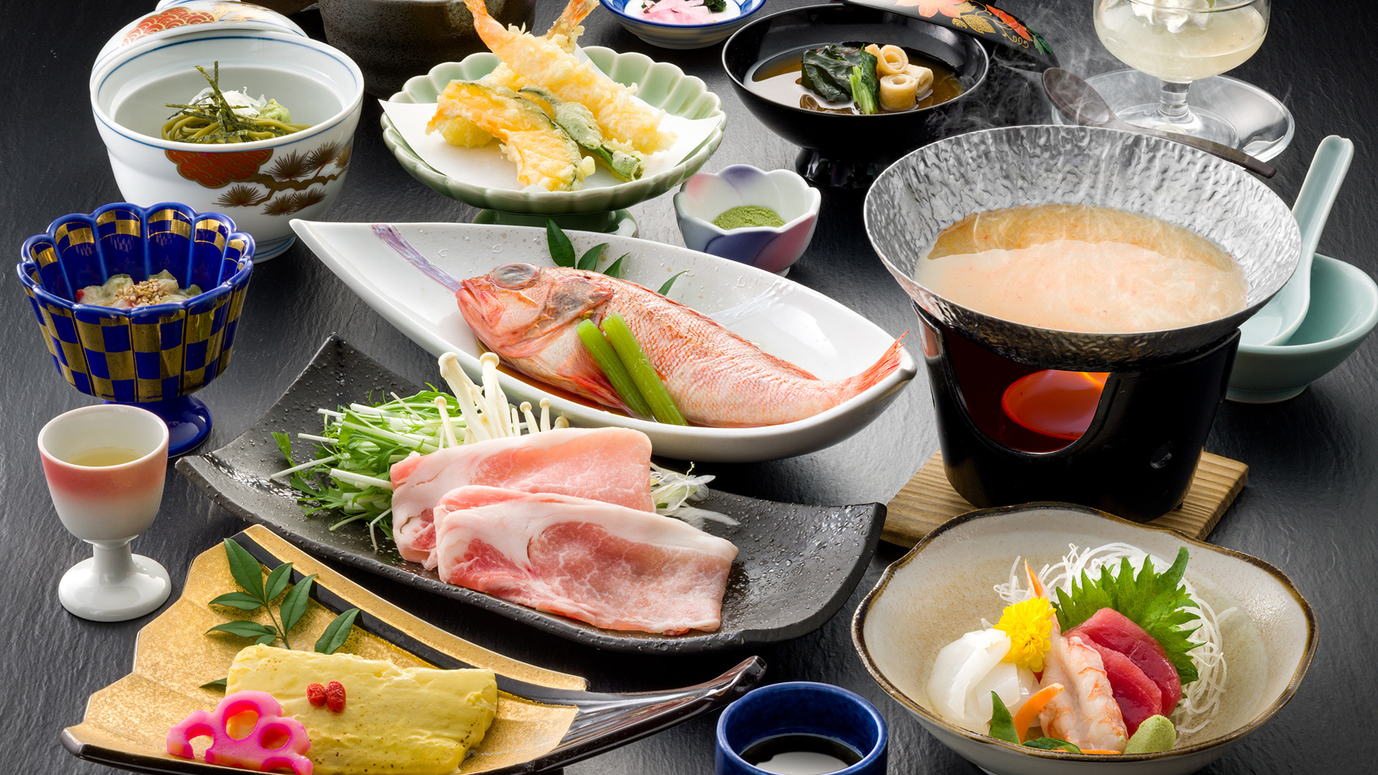 25夏　会席料理【旬】当館名物「吉良里クイーンポークの豆乳チゲ鍋」柔らかな肉質と豆乳の優しい逸品です