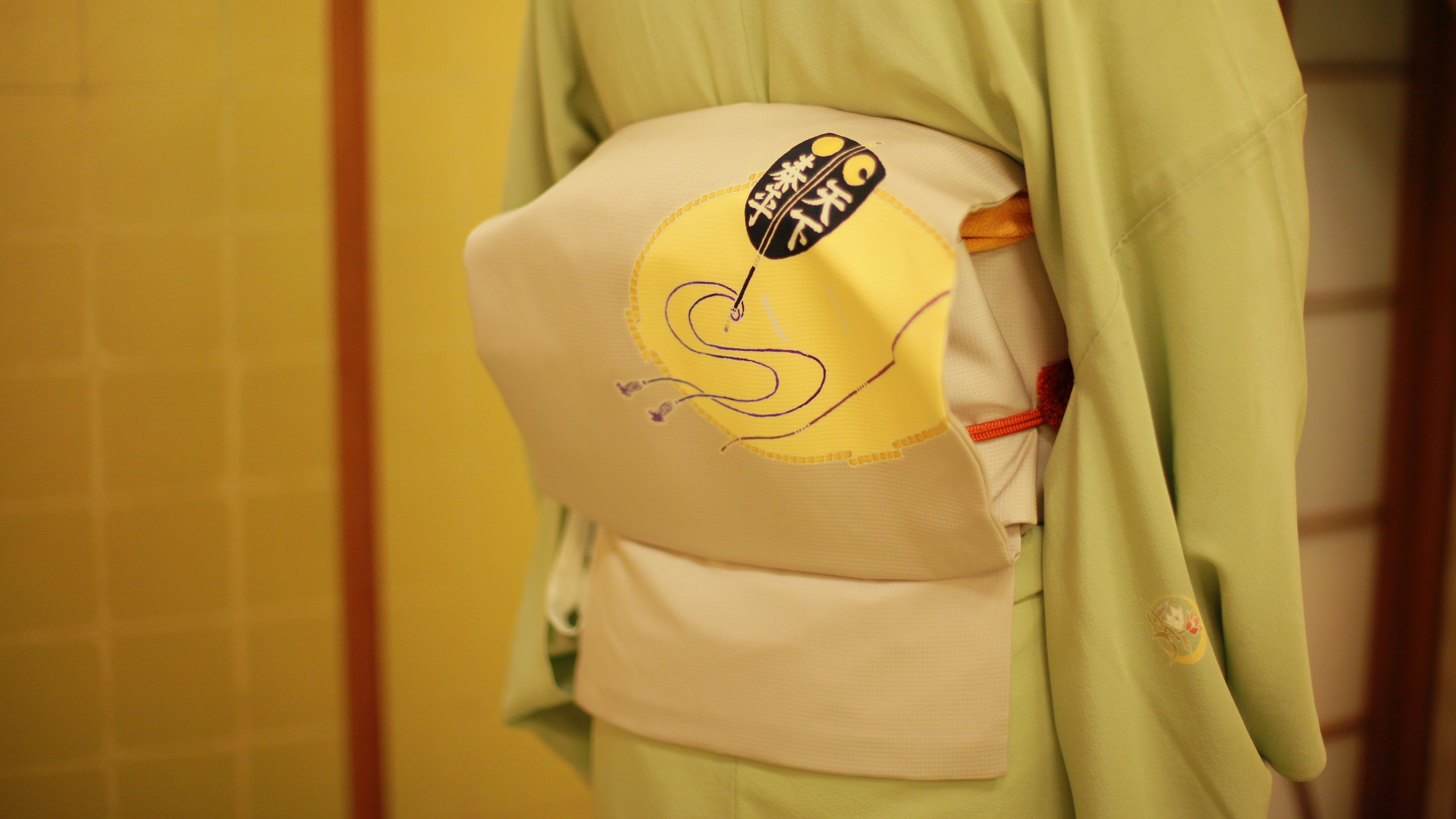 相撲好き女将（帯に注目）