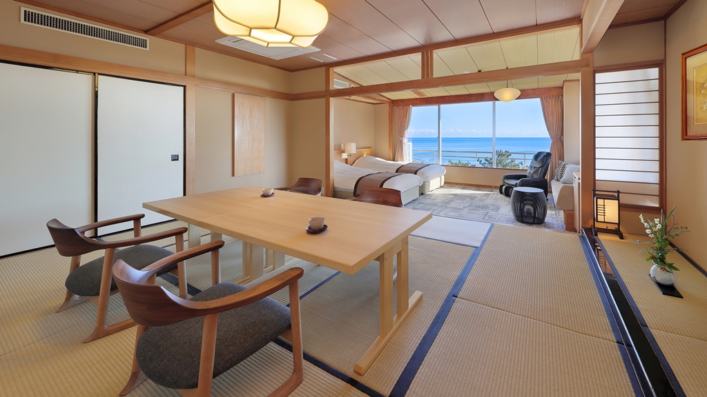 角部屋和洋室(12畳+TWベッド+ソファ+内風呂)