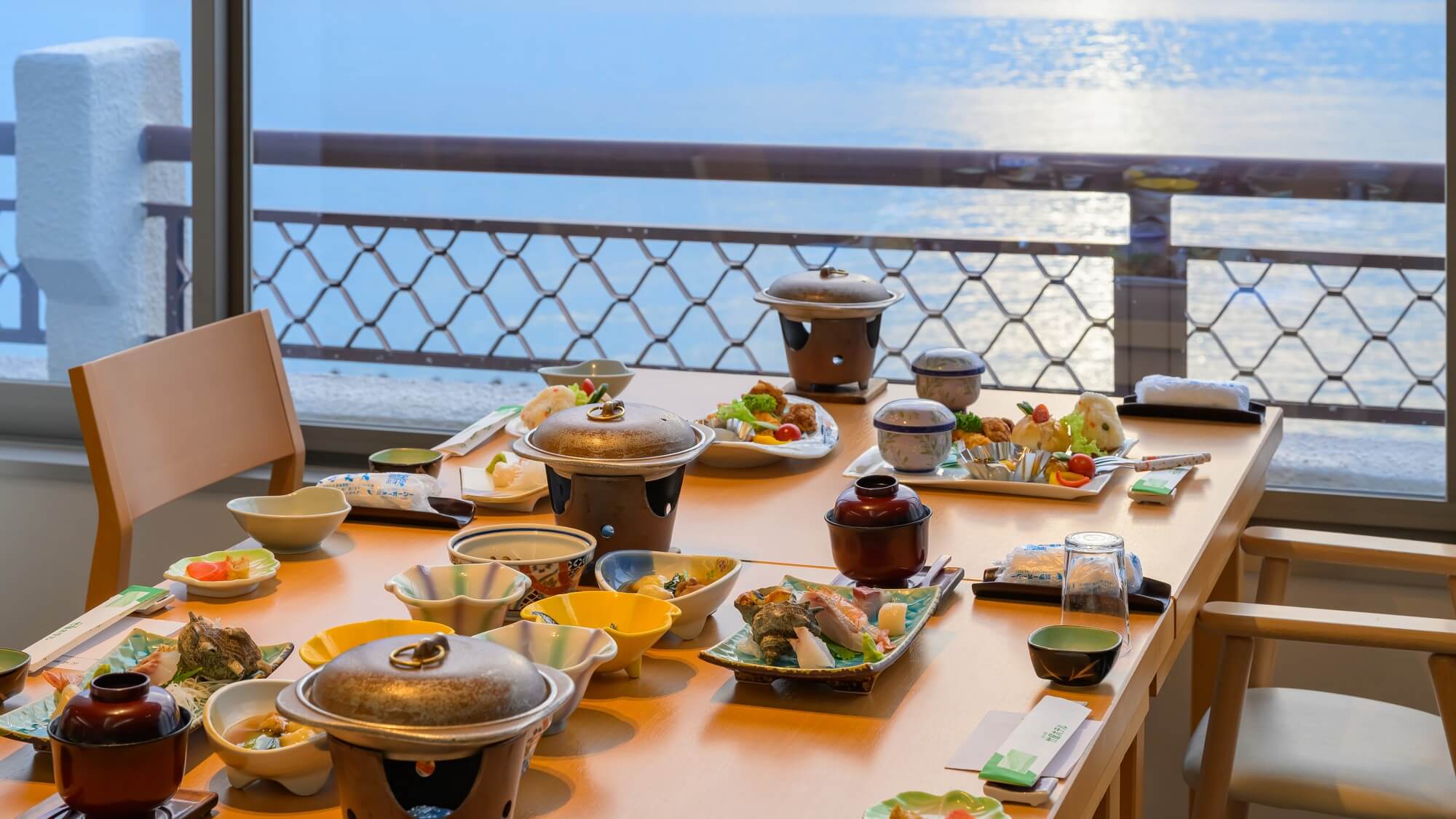 【ご夕食一例】心安らぐ海の絶景とともに、庄内浜の海の幸や季節の美味をお楽しみください。