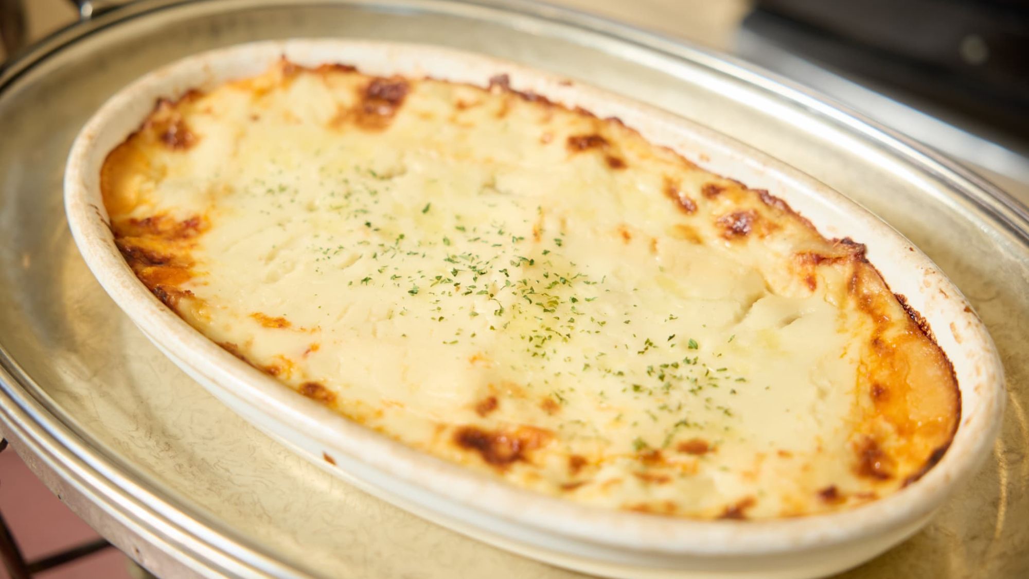 【朝食｜グラタン】とろ～りチーズが食欲をそそる温製メニュー。洋食派の方にも大人気。