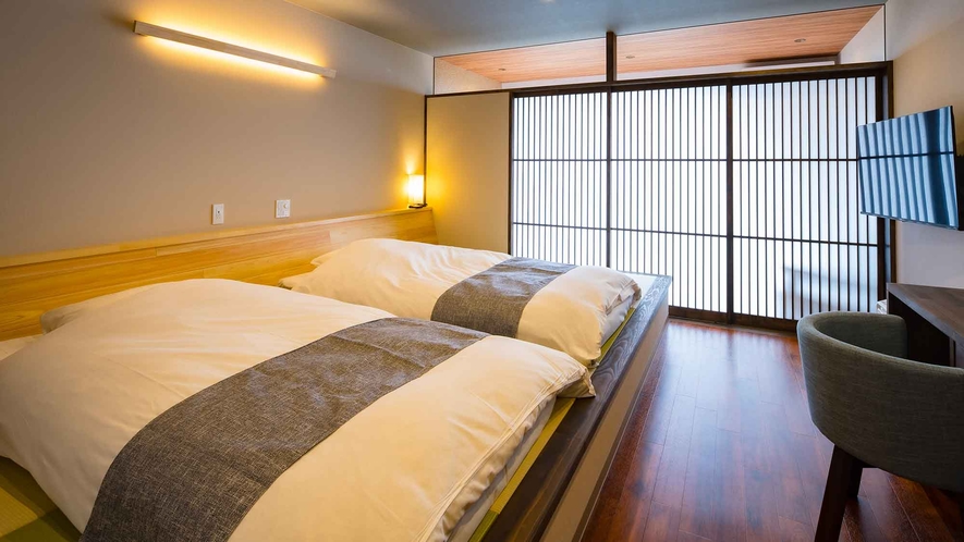 ・【海側和洋室一例】琉球畳の小上がりに布団をご用意しております