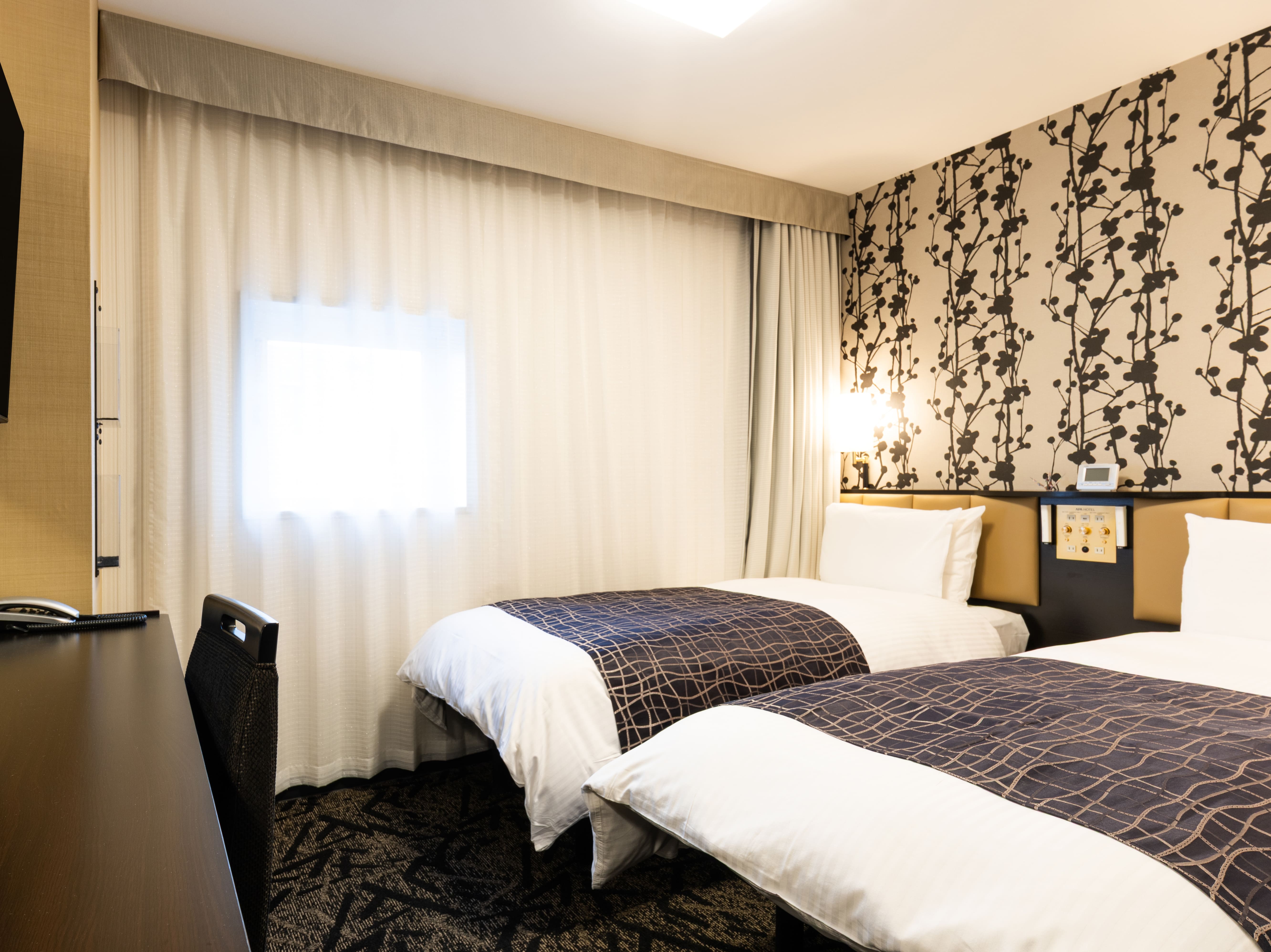 ツインルーム（広さ16㎡/ベット幅90cm&times;2台）