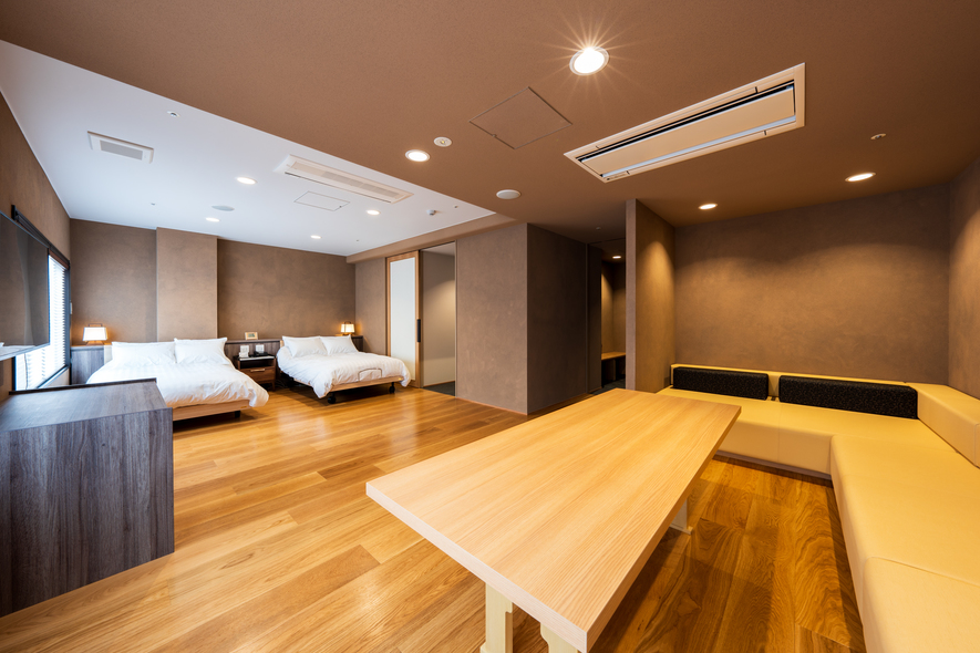  源泉かけ流し温泉付きツインルーム「湯楽」ベッド＋リビング