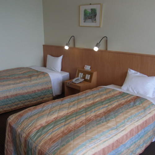This Western-style room has an ocean view. You can see the Genkai Sea from the window!