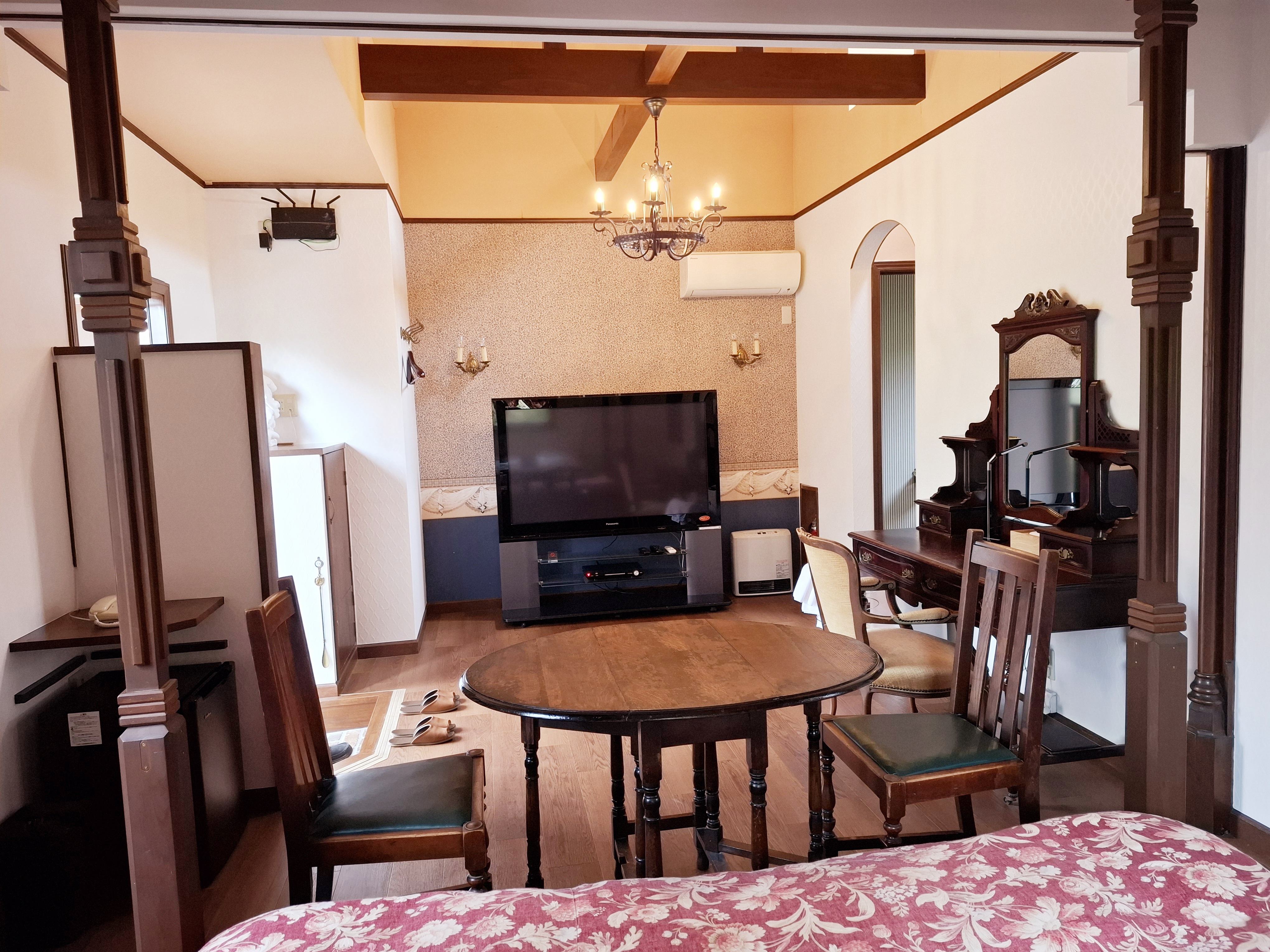 スタンダードルーム（106）のベッドリビング