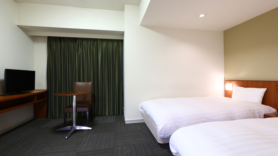 スタンダードツイン(シモンズ社製:100×205センチのシングルベッド2台)約22平米