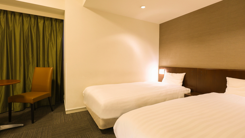 スタンダードツイン(シモンズ社製:100×205センチのシングルベッド2台)約22平米