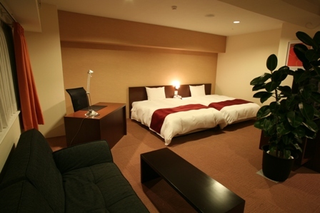 [Esprit Twin Room] A suite with two 140 cm wide beds.