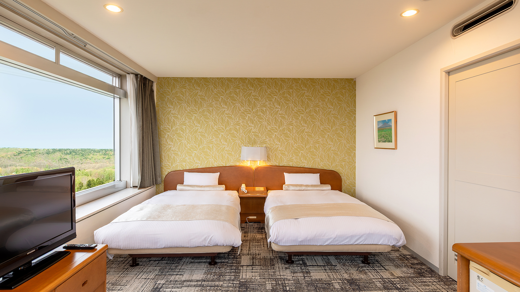 【パノラマビューツイン】ゆったりとした休息をお届けするセミダブルサイズのベッド