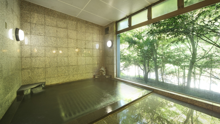 【男性大浴場】御影石を使用した内風呂、露天を併設