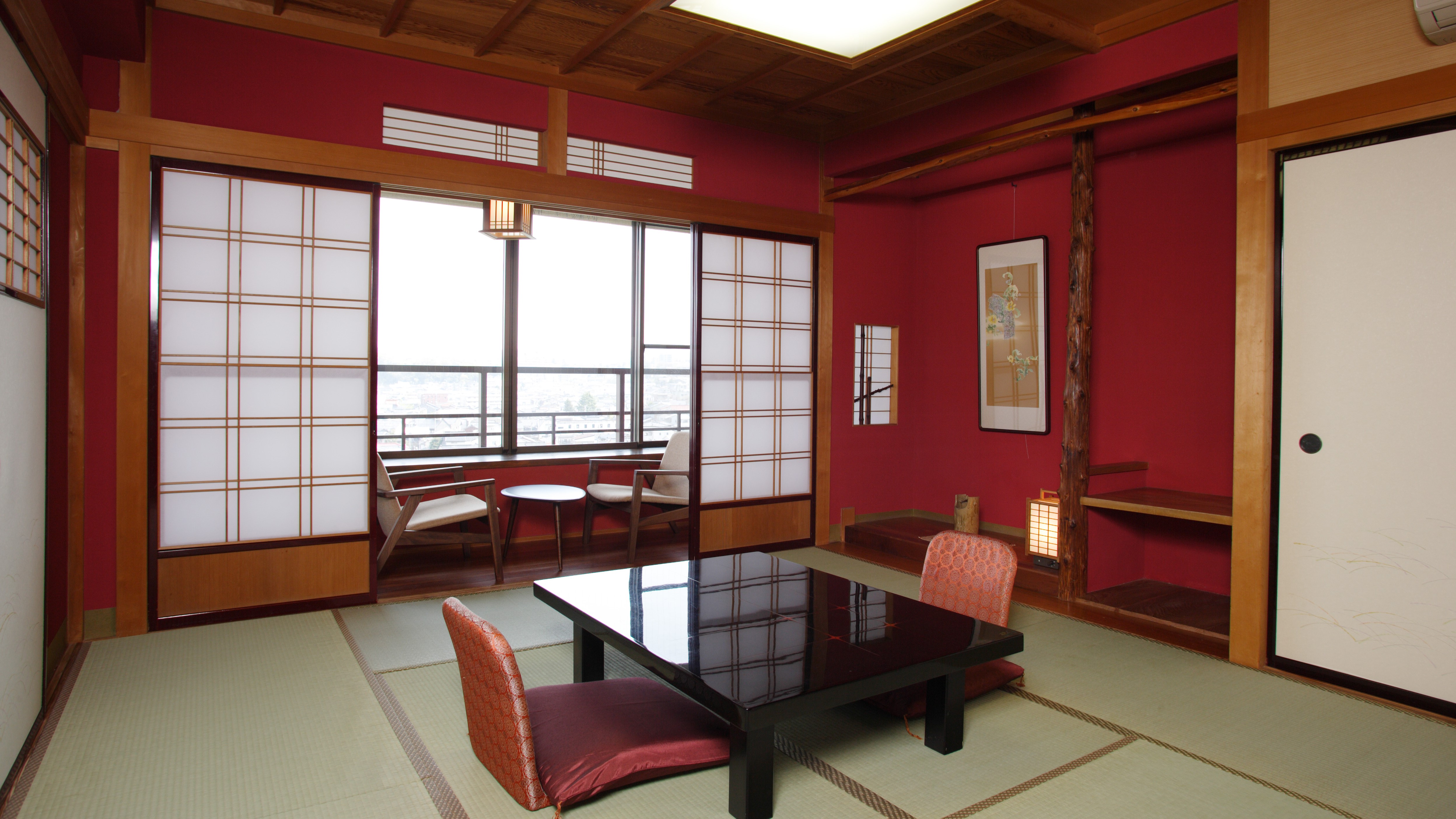 【ジュニアスイート・居間】金沢伝統の落ち着いた朱塗壁の客室（3室/5室中）