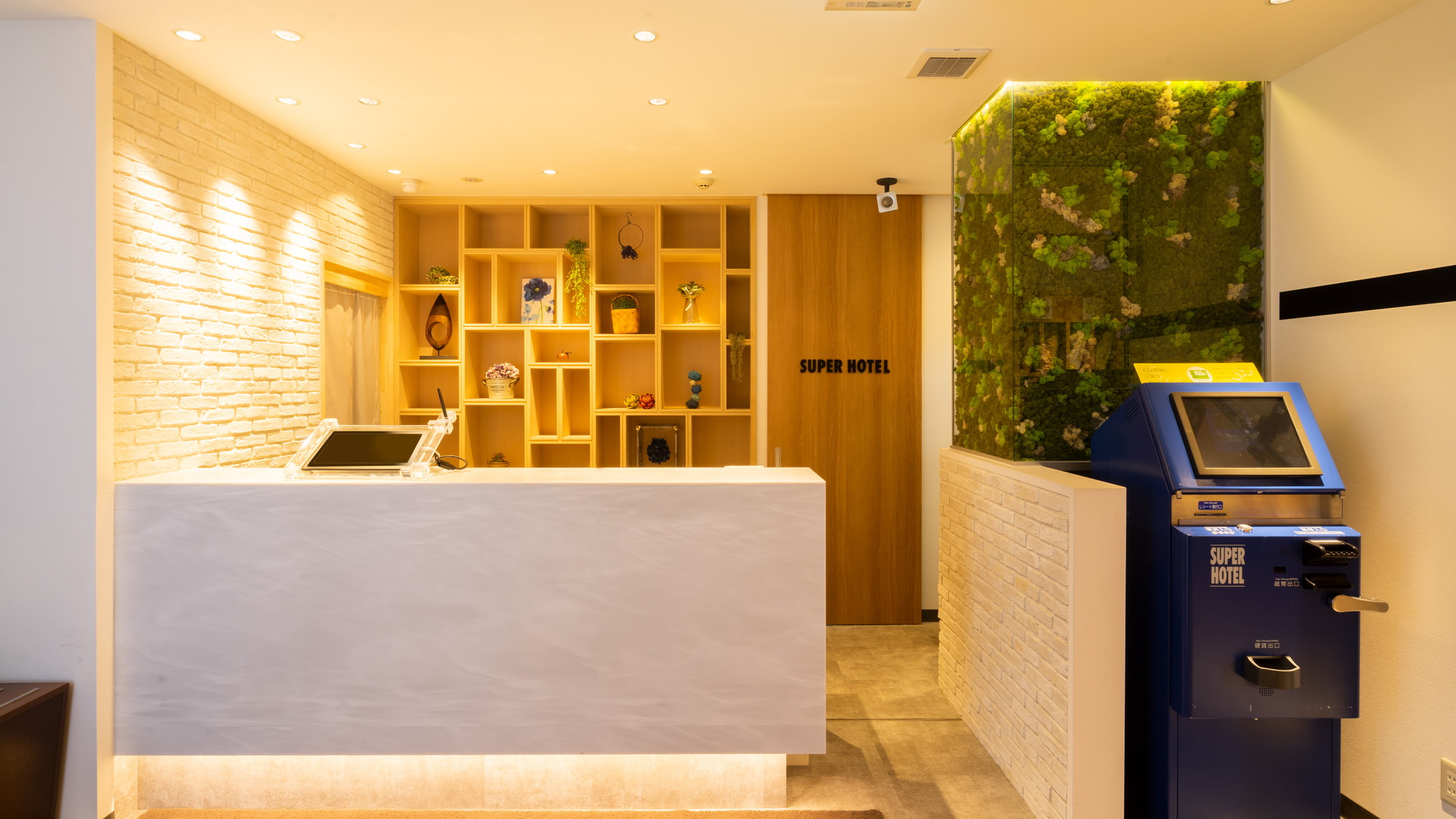 「おかえりなさいませ」こちらでチェックインを承ります