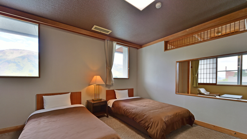 和洋室［2ベッド+畳スペース］のベッドルーム