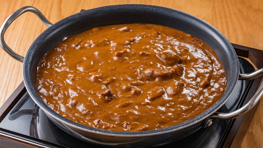 朝食（もつカレー）