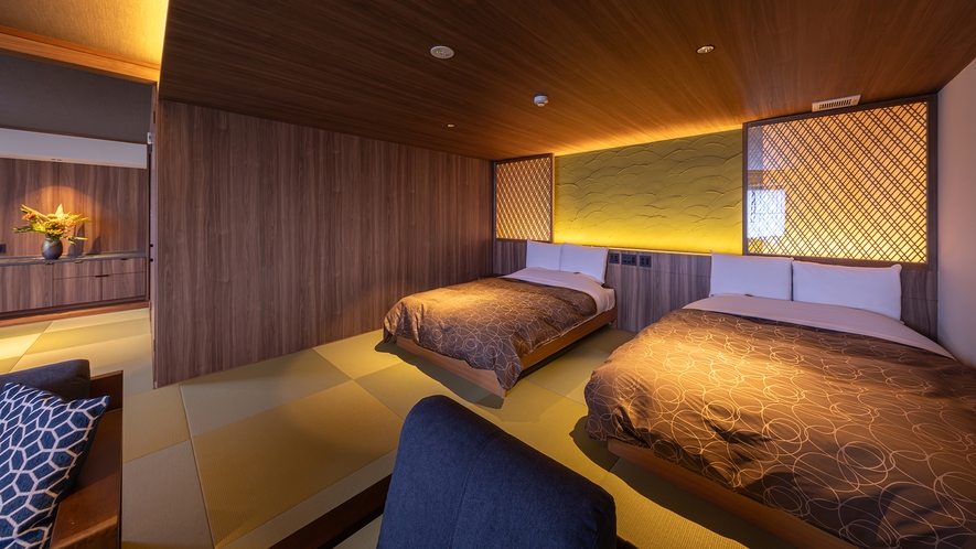 みんなで過ごす特別な時間、56平米の快適な和洋室。心地よいツインベッドで快眠を。