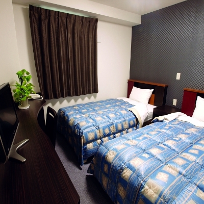 Twin room ◆ Area: 15 square meters ◆ Bed width: 110 cm