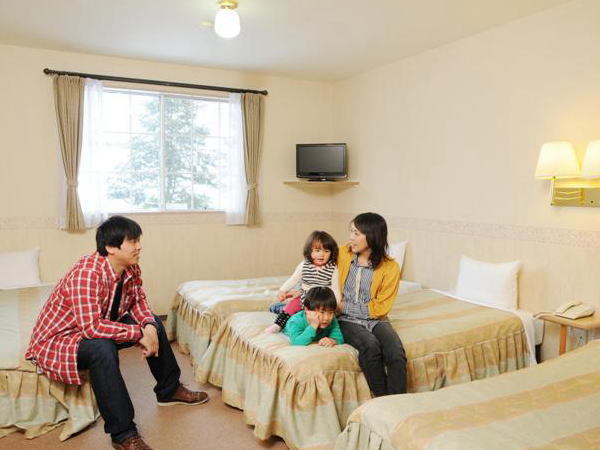 Family relaxing in the room