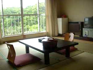 A 10-tatami room with a view of the ocean and a toilet