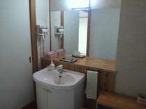 Washbasin with hairdryer in all rooms