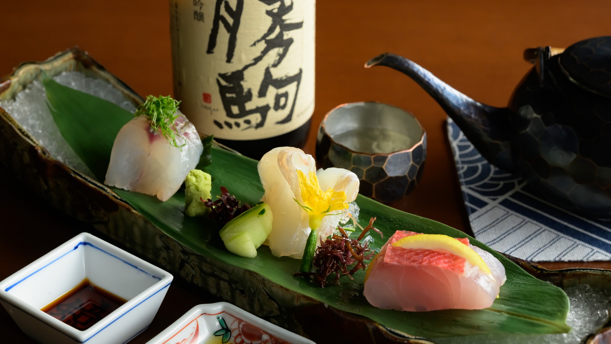 大分産の真子鰈や鯒のお造りは、富山の銘酒「勝駒」純米吟醸とともに。
