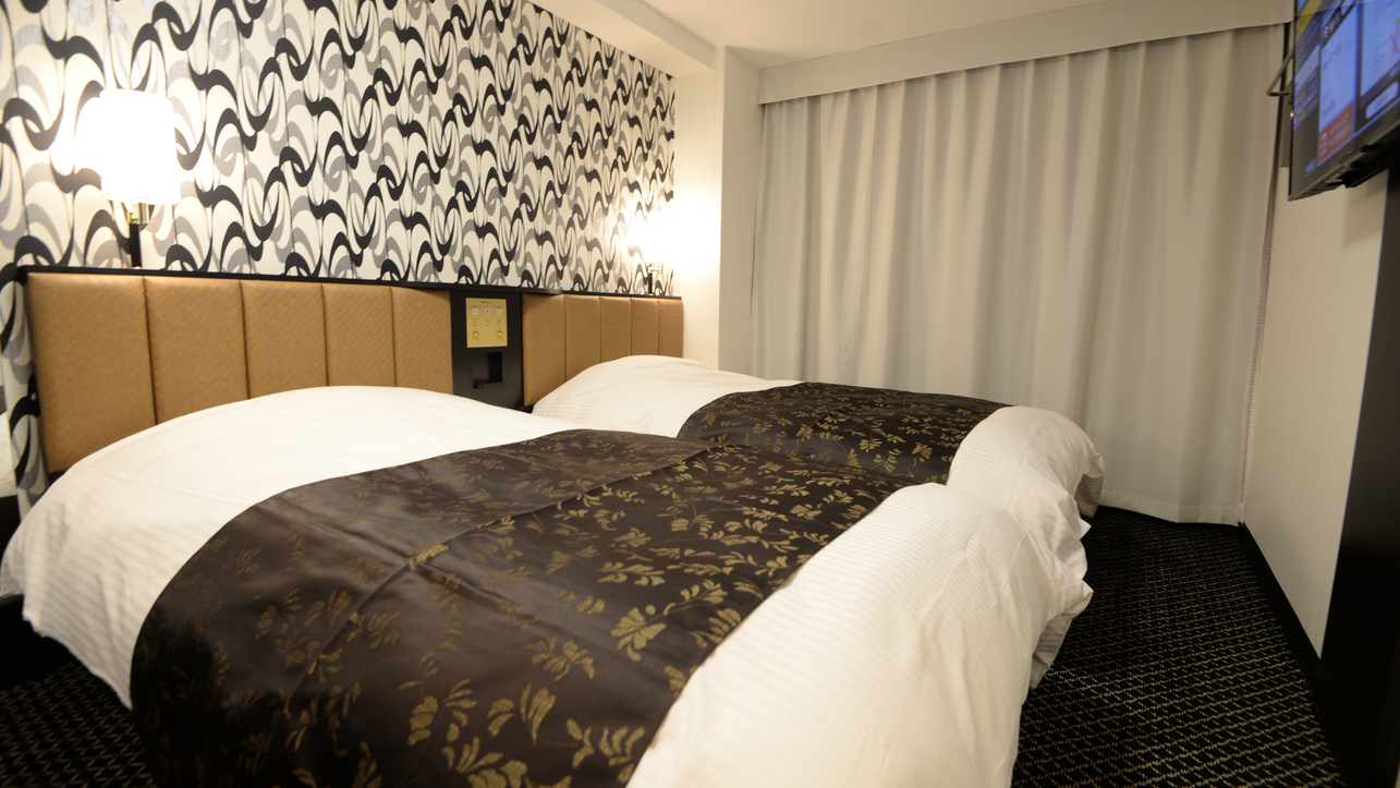 客室（ツイン）広さ16㎡／ベッド2台（110㎝幅タイプ）