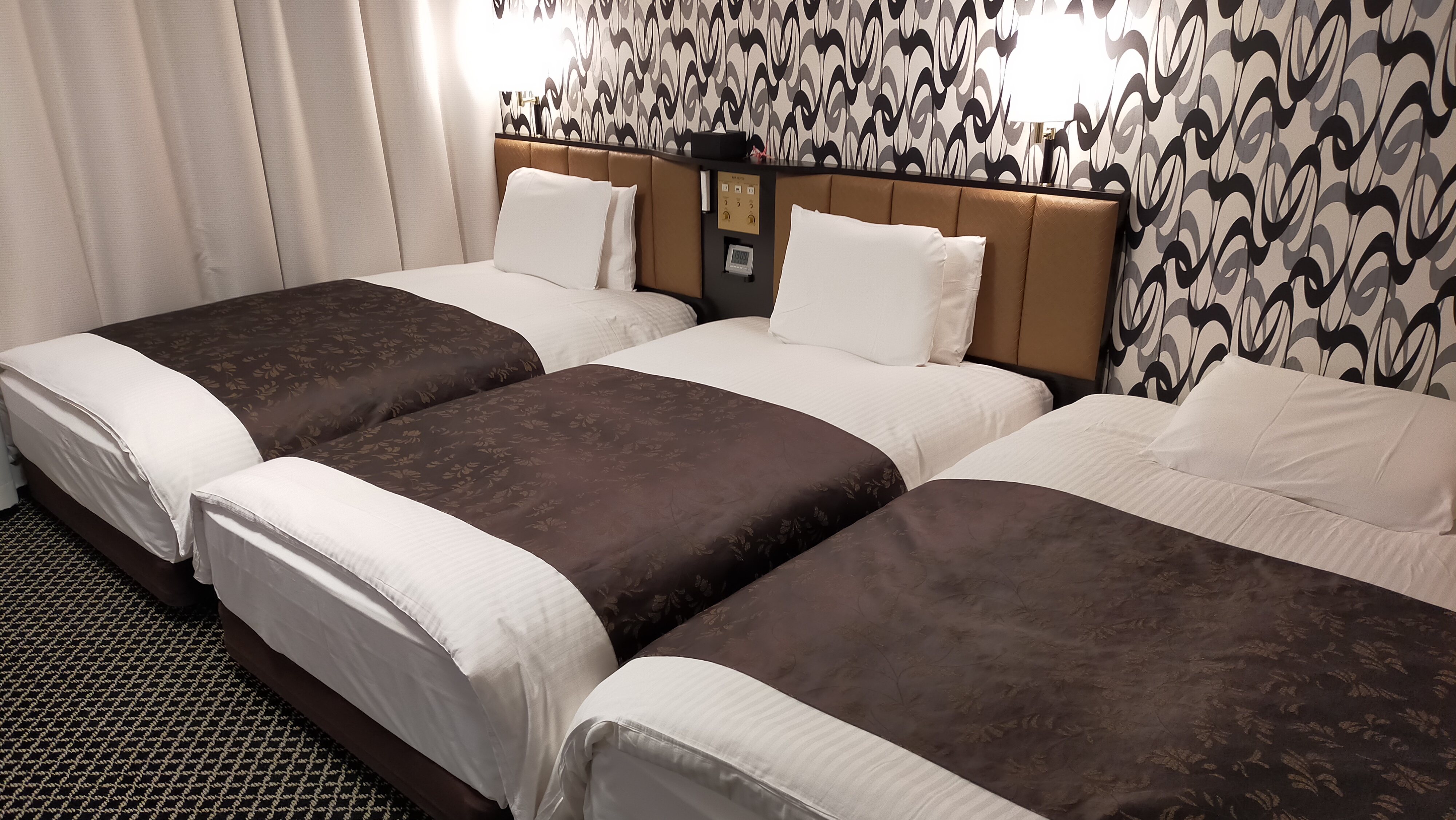 客室（トリプル）広さ27㎡／ベッド3台（110㎝幅タイプ）