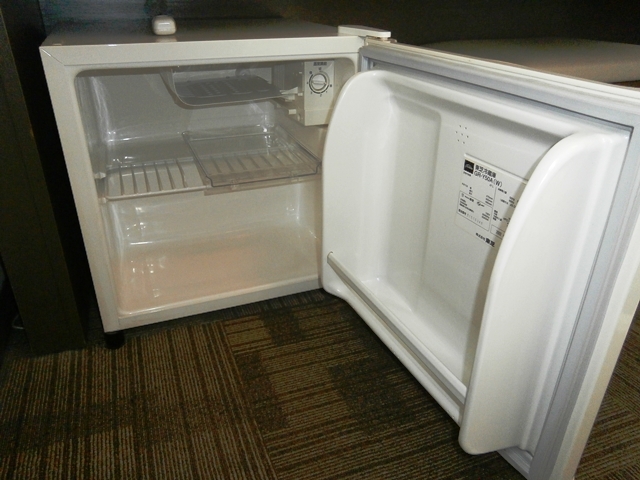 Rooms have an empty refrigerator