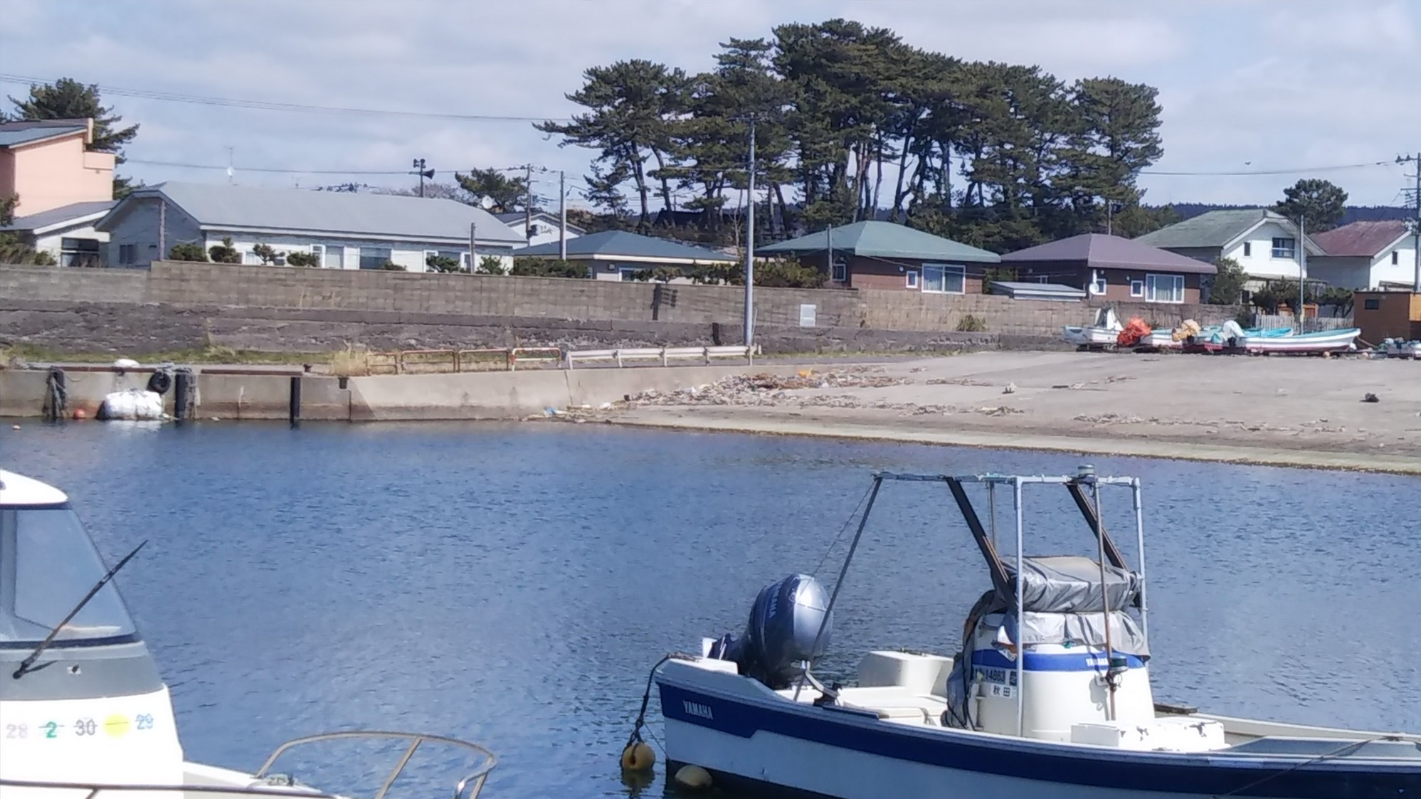 海からの「潮さい」遠景