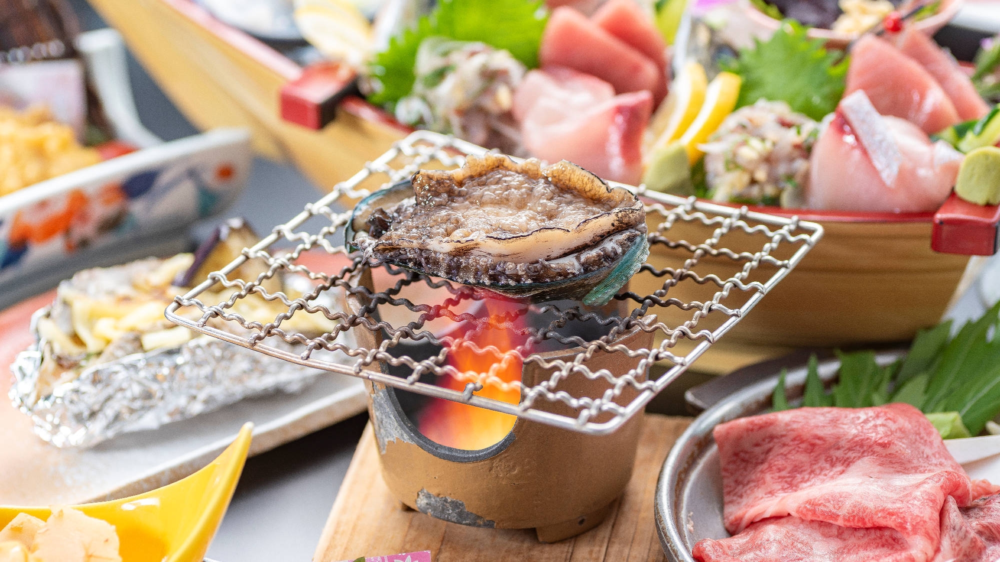 春〜夏が旬★【活あわびの踊り焼付き会席】おひとり様につき活あわび1個！目の前で焼く鮑の踊り焼きプラン