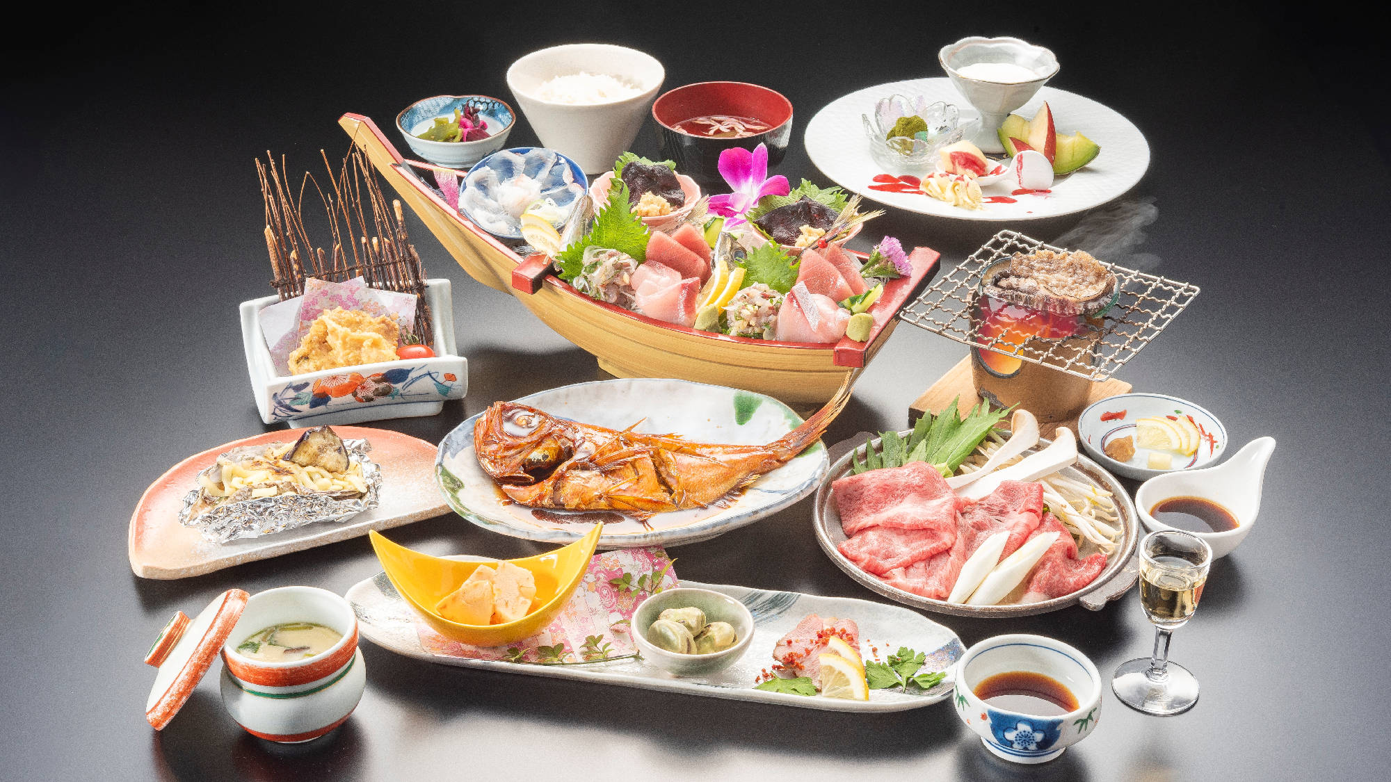 活き鮑の踊り焼きお一人様に付き１個付！目の前で踊る新鮮は活き鮑をアツアツでお召し上がりくださいませ。