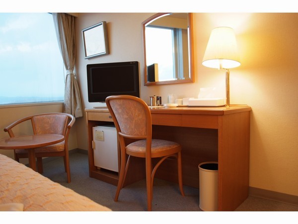 Guest room desk (example) All rooms equipped with 20-inch wide-screen digital terrestrial TV