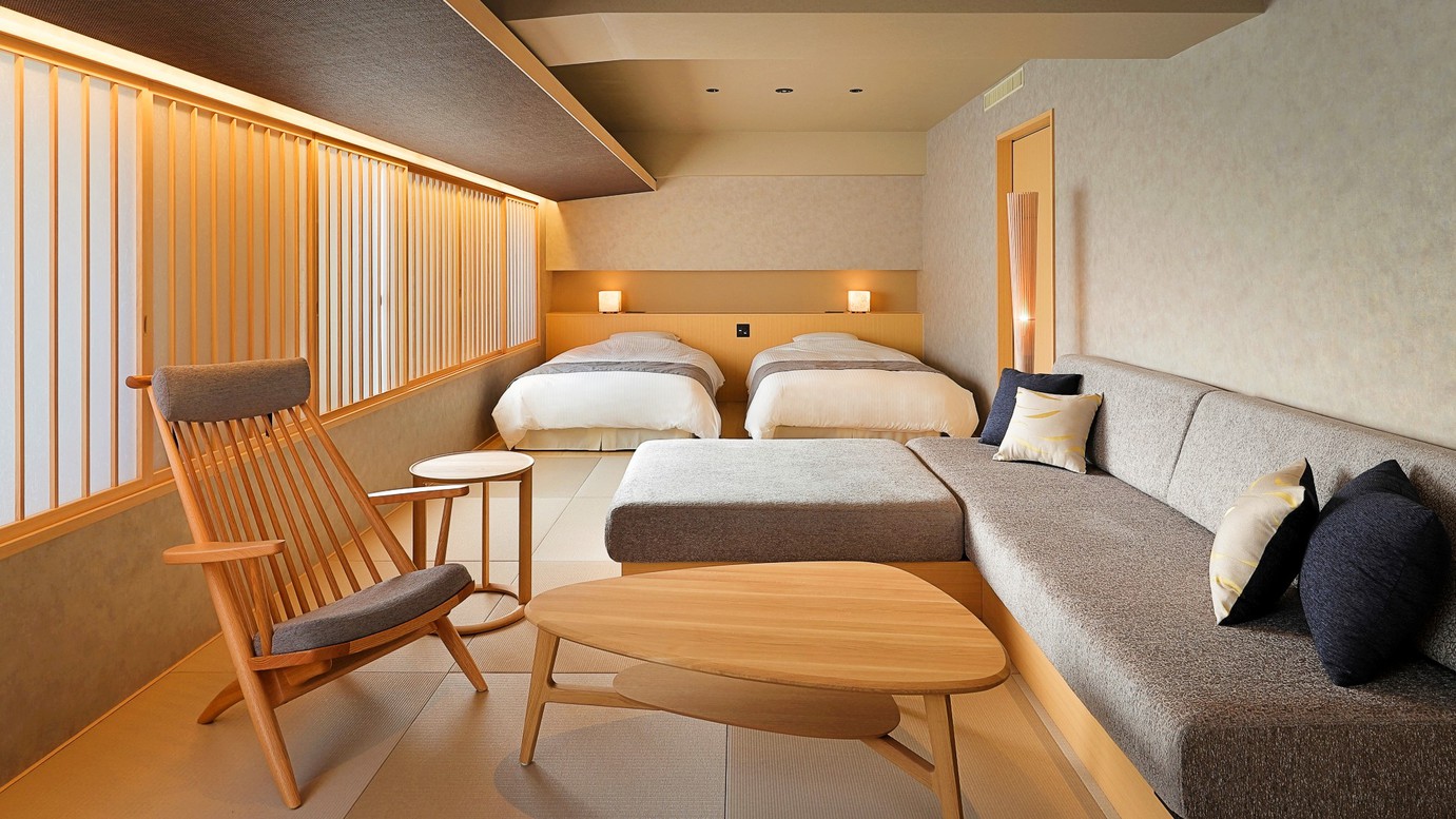 【西館プレミアムルーム～ひだまり～】2023年3月リニューアル　寝室ゾーンはツインベットを設えました